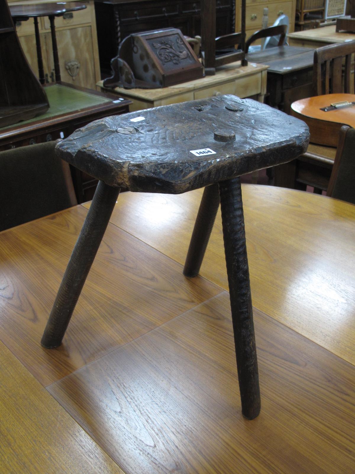 XIX Century Cutlers Stool, with shaped seat in tripod legs, 46cm high.