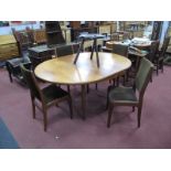 G-Plan Teak Extending Circular Topped Dining Table, circa 1970's, with fold-out centre leaf, on