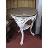 Cast Iron Britannia Style Bar Table, with mask decoration and circular wooden top, 60.5cm diameter.