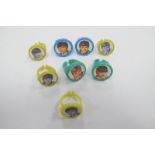 The Beatles, Two Sets of 1960's Plastic Rings, colour and black and white images of band members. (