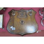 Early XX Century oak Shield Shape Wall Coat Stand, with three hooks and 'AS' monogram, 34cm wide.
