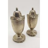 A Pair of Hallmarked Silver Pepperettes, Deakin & Francis, Birmingham 1912, each raised on