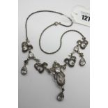 A Modern Necklace, of antique style openwork design, rubover set (indistinctly stamped "925"), to