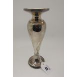 A Hallmarked Silver Vase, London 1917, of plain inverted baluster form (dents), with reeded rim,