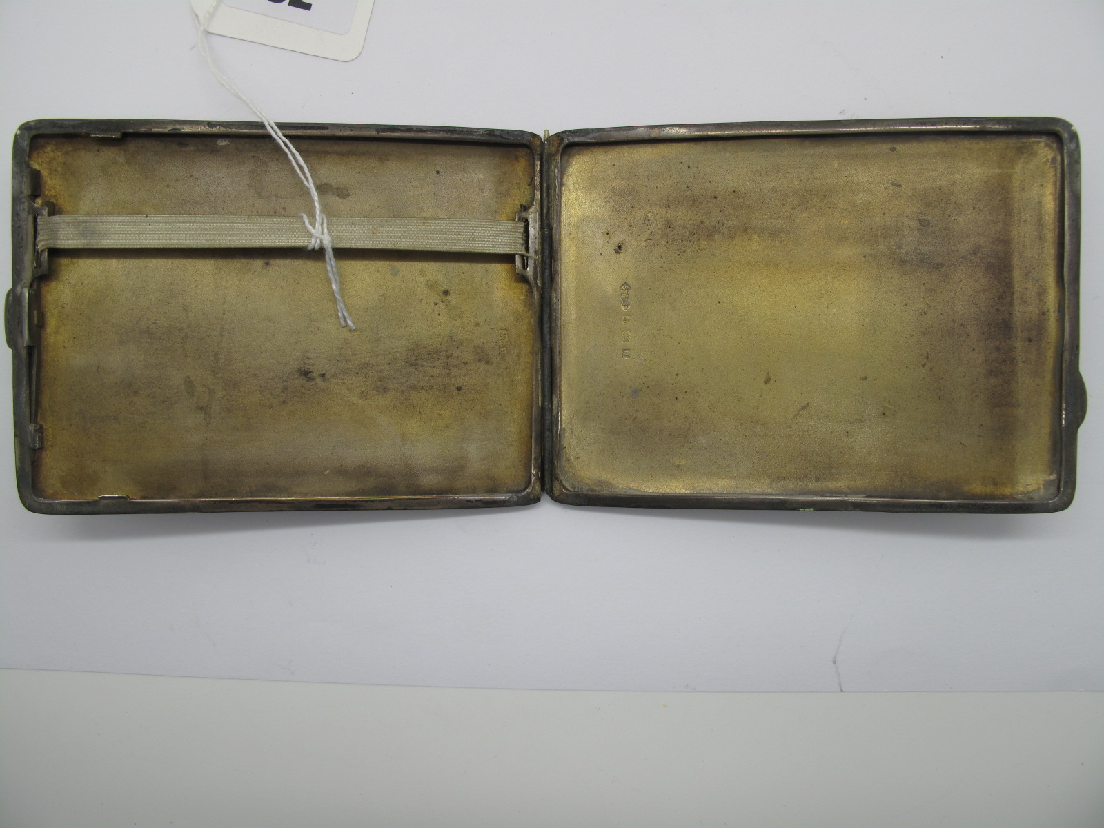 A Hallmarked Silver Cigarette Case, Birmingham 1933, of slim rectangular form, allover engine - Image 5 of 5