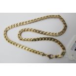 A 9ct Gold Gent's Curb Link Chain, of uniform design, 51cm long (52grams).