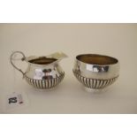 A Hallmarked Silver Jug and Matching Sugar Bowl, George Unite, Birmingham 1884, each of circular