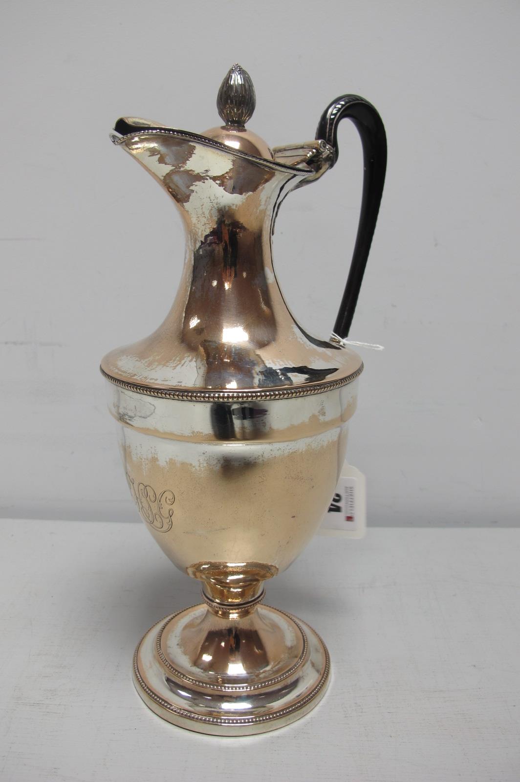 A XIX Century Plated on Copper Ewer, of plain design with beaded edge and high handle, on circular