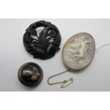 A Large Oval Shell Carved Cameo Brooch, depicting fairy and cherub (5.7cm long), collet set;