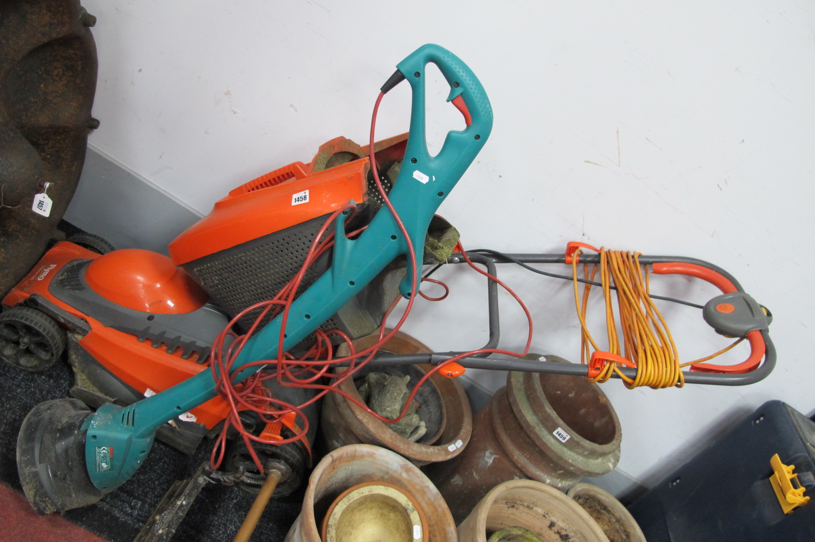 Electric Flymo, Bosch Strimmer - both untested sold for parts only. (2)