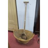 Oval Wicker Basket, agricultural mixing spade, 102cm long.