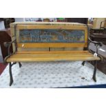 A Child's Garden Seat, having slatted wooden bars and African animal scene to metal back, 83cm