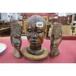 Carved African Hardwood Bust, 22cm high (damaged) wicker ringed stand, two slender examples. (3)