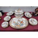 A Mid XIX Century Copeland Pottery Dinner Service, printed and overpainted with exotic birds in