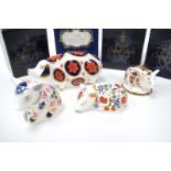 Four Royal Crown Derby Porcelain Paperweights; Pig, 12.5cm wide, Sitting Piglet, Piglet and Sleeping