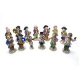 A Sitzendorf Porcelain Early XX Century Twelve Piece Monkey Band, including conductor, violinist,
