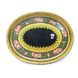A Mechi Papier Maché Oval Tray, painted with a band of pink flowers within elaborate gilt work,