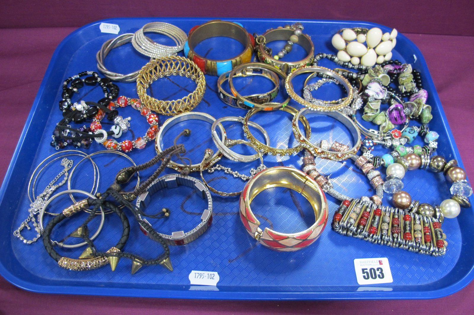A Selection of Modern Bracelets and Bangles, including diamante, sliding charm style, gilt coloured,