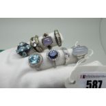 Eight Modern "925" Dress Rings, (finger sizes N, O, Q) (total weight 38grams). (8)