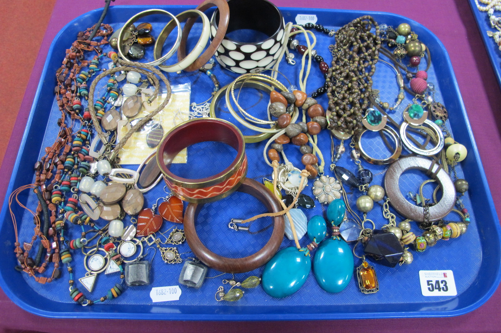 A Selection of Modern Ethnic Style Costume Jewellery, including bangles, bead necklaces, ornate drop