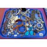 A Selection of Modern Ethnic Style Costume Jewellery, including bangles, bead necklaces, ornate drop