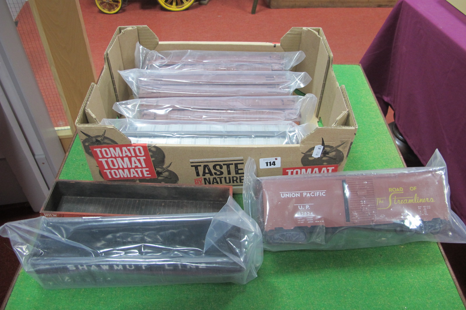 Seven 'O' Gauge American Eight Wheel Box Cars and Open Wagons, all used, unboxed.