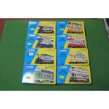 Eight Corgi Classic Trams, all boxed, all different.