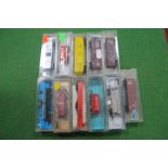 Eleven 'N' Gauge American Outline Eight Wheel Boxcars/Tankers etc, mainly Atlas, used, cased.