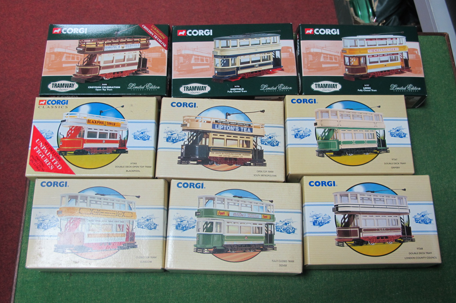 Nine Corgi Classic Trams, all boxed, all different.