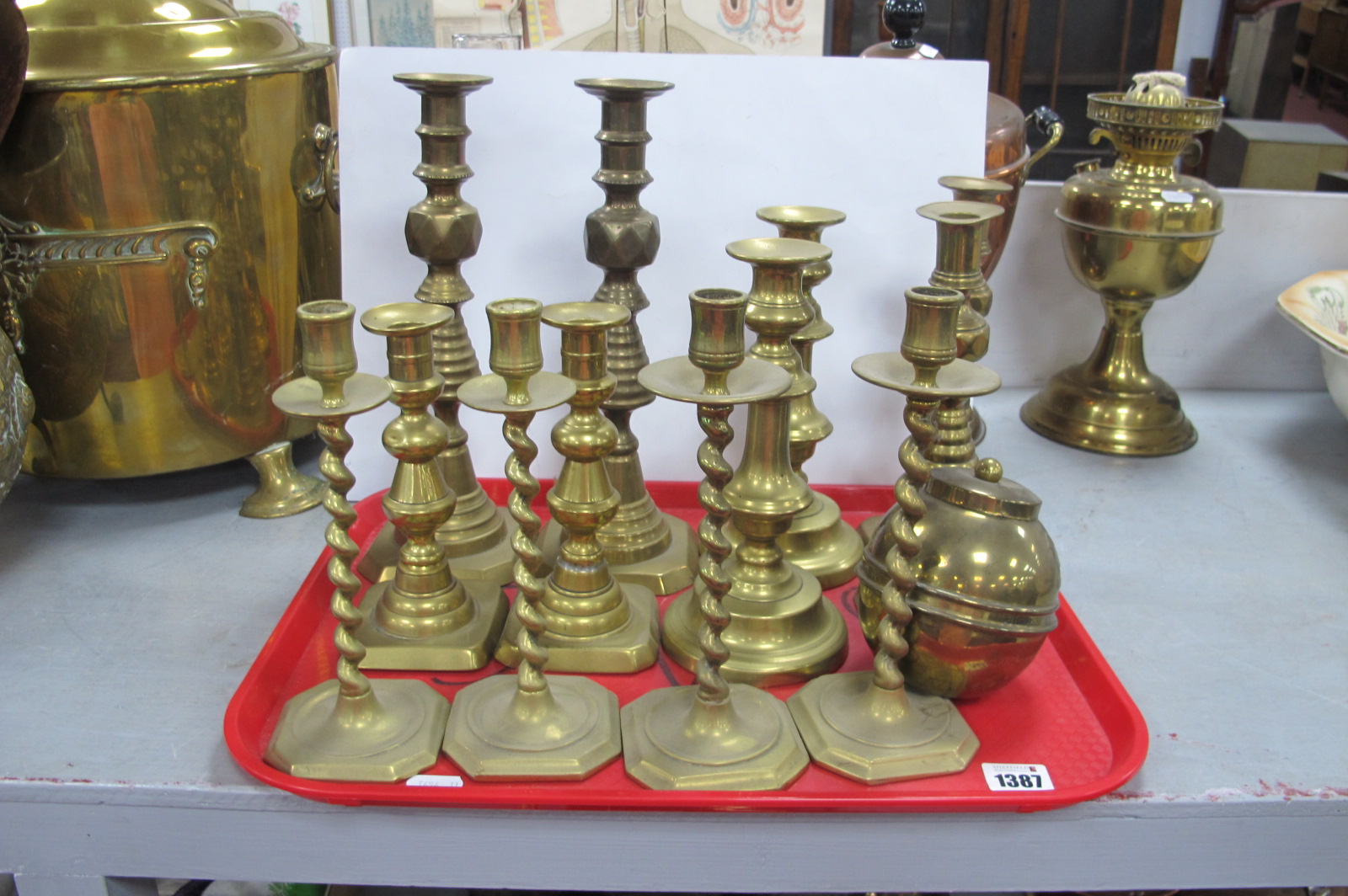 Six Pairs of Brass Candlesticks, the highest 29cm, 1924 Empire Exhibition tea caddy:- On Tray