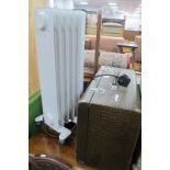 A Moretti Radiator, Singer electric sewing machine, untested sold for parts only. (2)