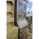 An Early XX Century Oak Bureau Bookcase, with green heart shaped insets to lead glazed upper