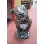 A Painted Concrete Door Stop, as a Staffordshire dog, 4.6cm high.