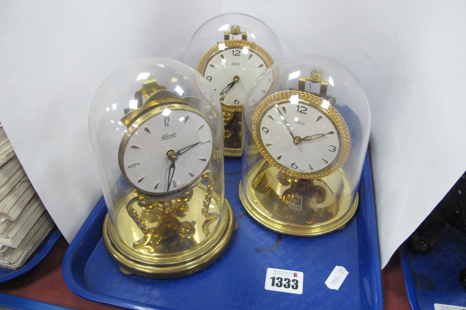 Kundo Clocks Under Glass Domes, the highest 16.5cm. (3)