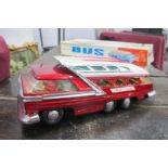 A Tin Plate Mystery Action Bus, ME083 in original box.
