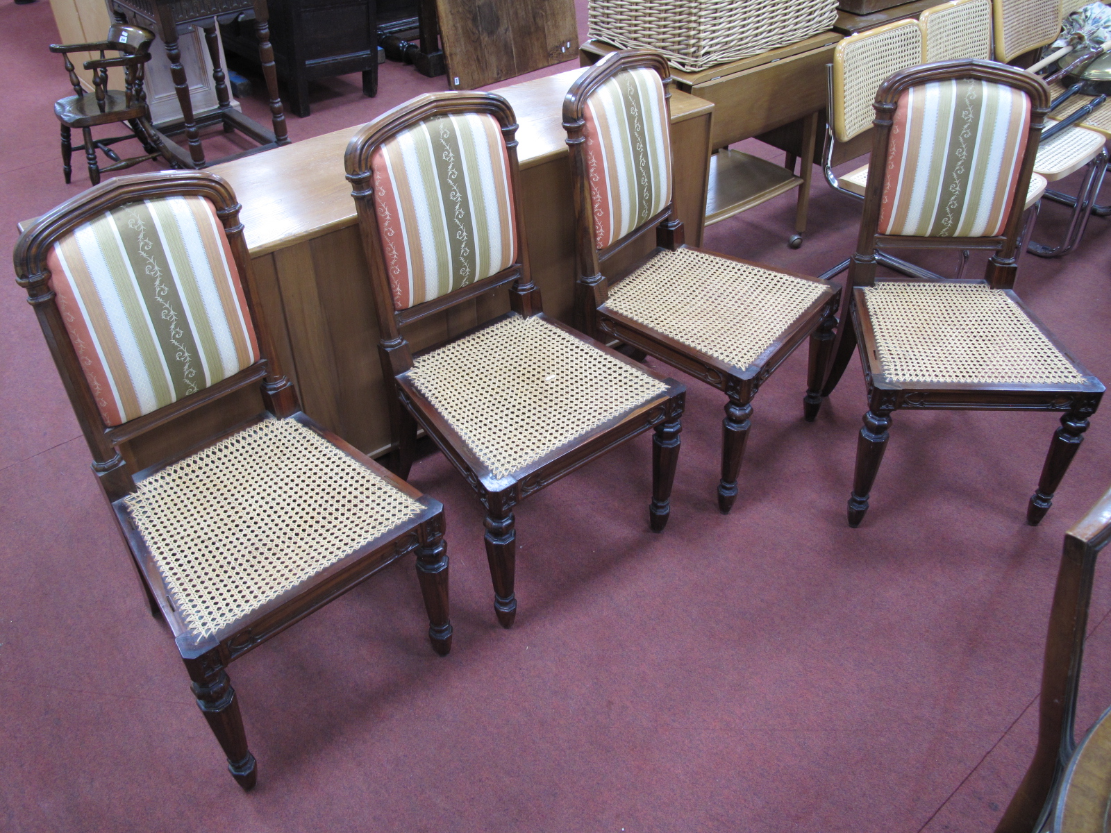 A Set of Four William IV Rosewood Chairs, with reeded top rails, upholstered centre panels and caned - Image 6 of 6