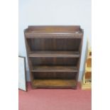 A 1920's Oak Freestanding Bookcase, with gallery, dentil bar below, three adjustable shelves, 76cm