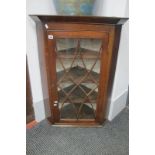 A XIX Century Oak Flat Fronted Corner Cupboard, with astragal glazed door to three internal shelves,