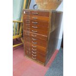 Chest of Thirteen Mahogany Fronted Filing Drawers, circa 1930's, having metal pull handles and slots