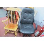 A Black Swivel Office Chair, on five star base, kitchen style rocker. (2)