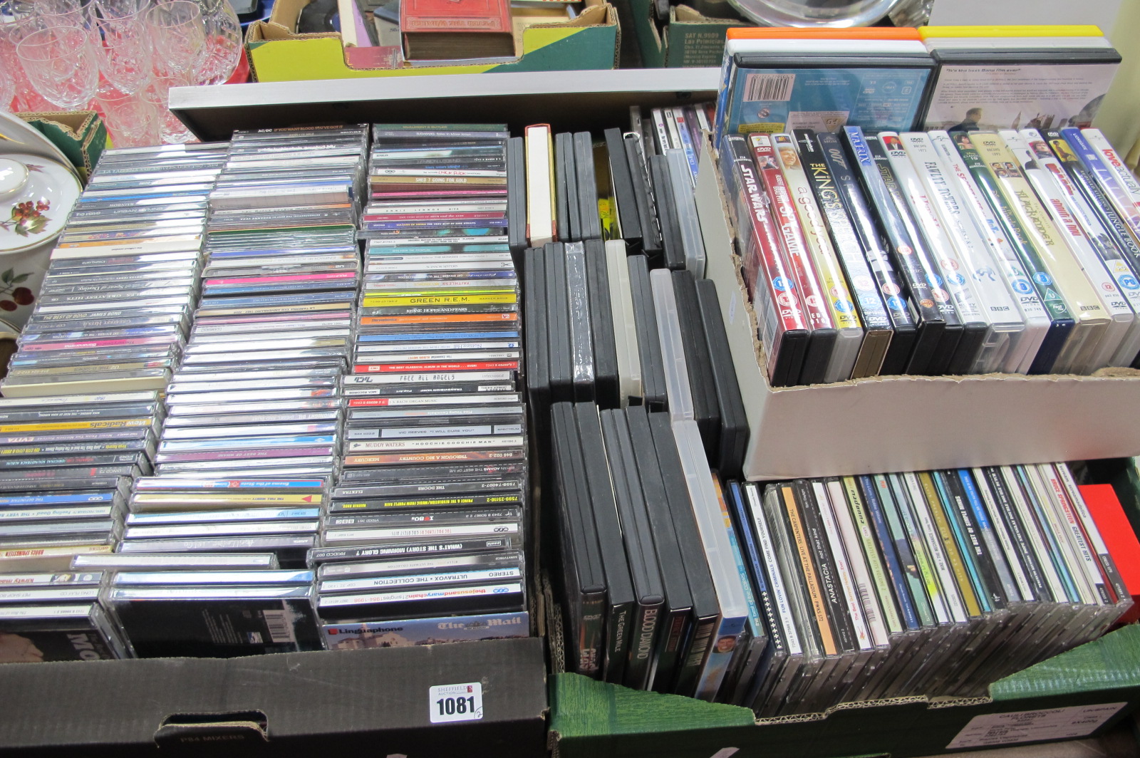 A Large Quantity of CD's, varying genres, including DVD's. Plus some empty cases, hangover cures