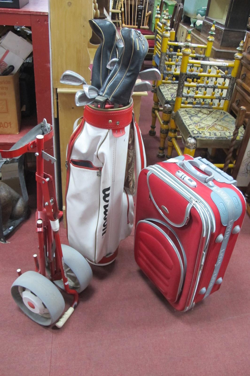 Howson Golf Clubs, balls, etc, in bag and Stowaway trolley, plus Liquin suitcase.