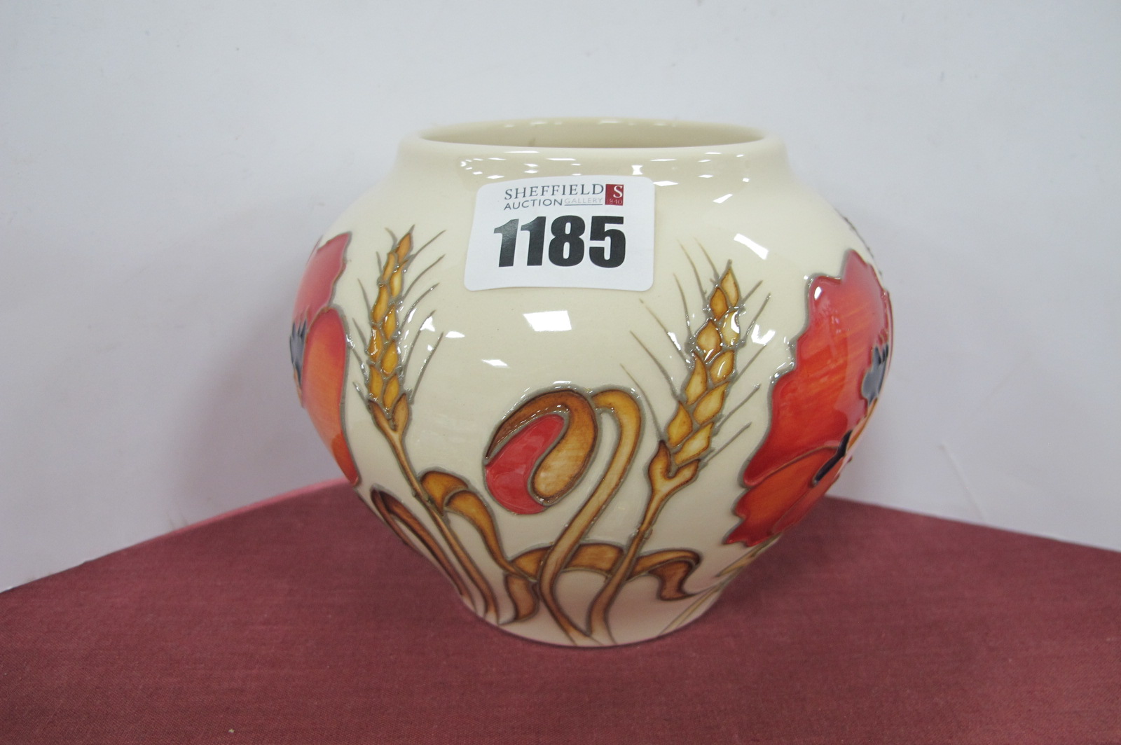 A Moorcroft Vase, painted in the 'Harvest Poppy' design by Emma Bossons, shape 402/4, impressed