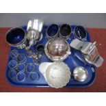 Hallmarked Silver and Other Napkin Rings, decorative set of three plated salts, with blue glass