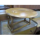 Oak Drop Leaf Coffee Table, 61.5cm diameter circular top, on turned supports.