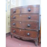 An Early XIX Century Mahogany Bow Fronted Chest of Drawers, with two short drawers, three long