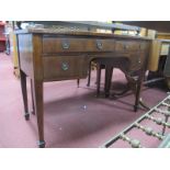 An Early XX Century Mahogany Bow Front Dressing Table, with four drawers on tapering legs and