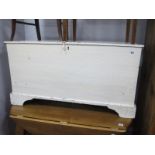 A XIX Century White Painted Pine Blanket Box, on bracket feet.