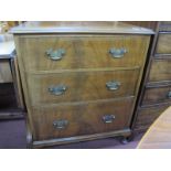 A 1930's Mahogany Chest of Three Drawers, with low back, on cabriole legs, bearing label "Ralph