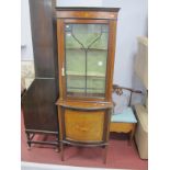 An Edwardian Mahogany Inlaid Display Cabinet, with a stepped cornice inlaid frieze, glazed door,